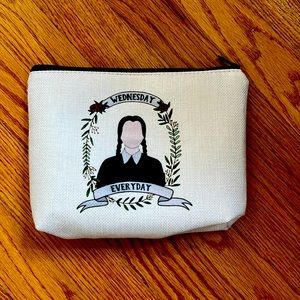 Brand new never used Wednesday Addams zip pouch 9” wide x 7” long